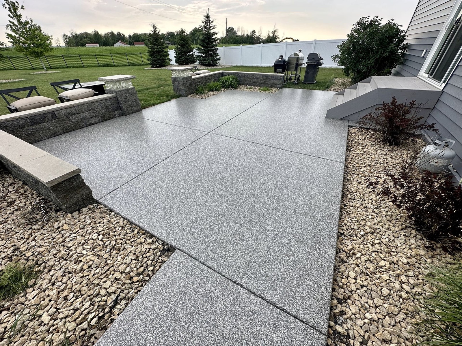 Coated backyard concrete patio
