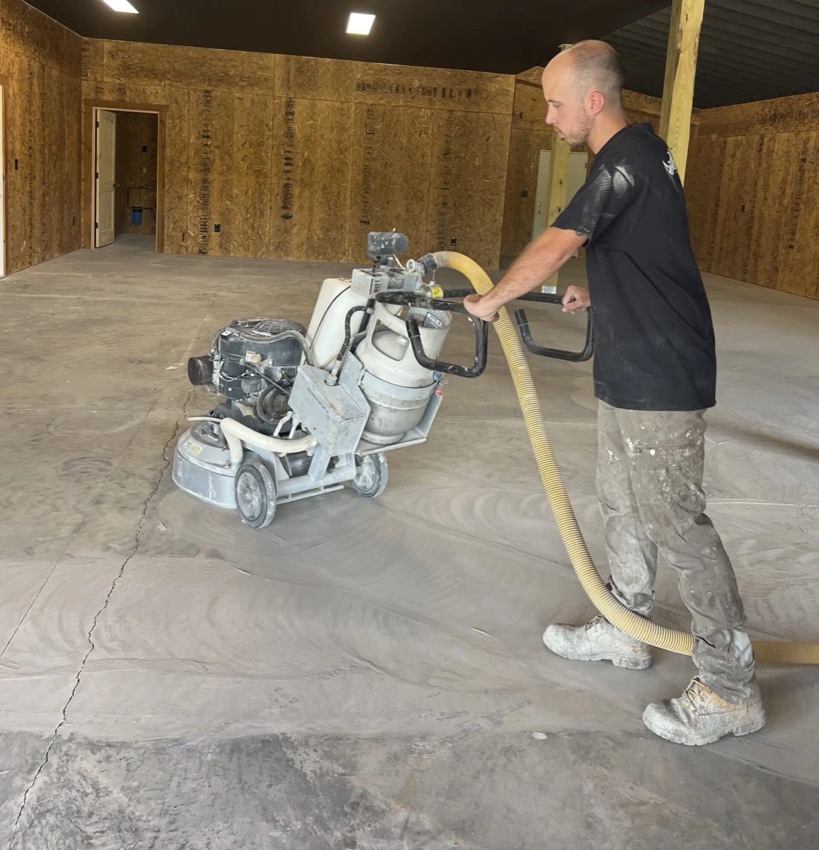 Kraken crew diamond grinding a concrete floor